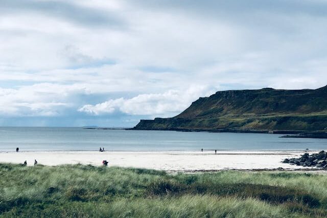 Isle of Mull, Scotland, United Kingdom: Beautiful beach scene on the Isle of Mull, Scotland with clear skies and coastal views.